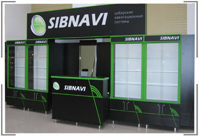 Фирменный салон мобильной электроники SIBNAVI в городе Омске торговый центр Континент. В состав оборудования входит четыре витрины с подсветкой,  стол рецепшен, световой бокс